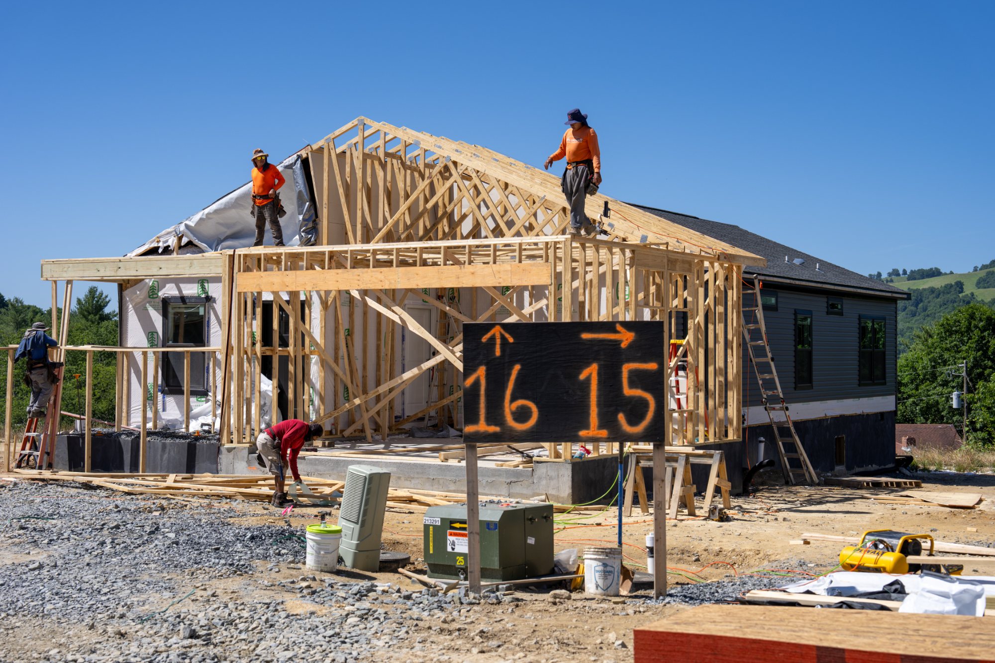 Crews framing a Blue Haven home
